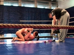 Lesbian babes enjoying naked wrestling