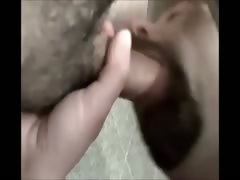 SUCKING UNCUT COCK UNDER STALL