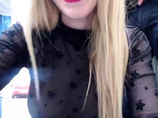 Blonde teen girl playing on webcam