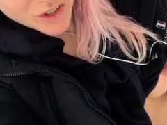 Outdoor solo masturbation scene with curly blonde