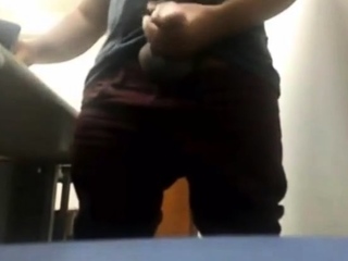 Brazilian Daddy Strokes His Big Uncut Cock at Work